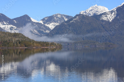 Snow capped mountains and a lake on Vancouver Island  British Columbia  BC   Canada