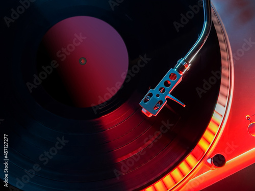 turntable dj top view needle with red and blue light