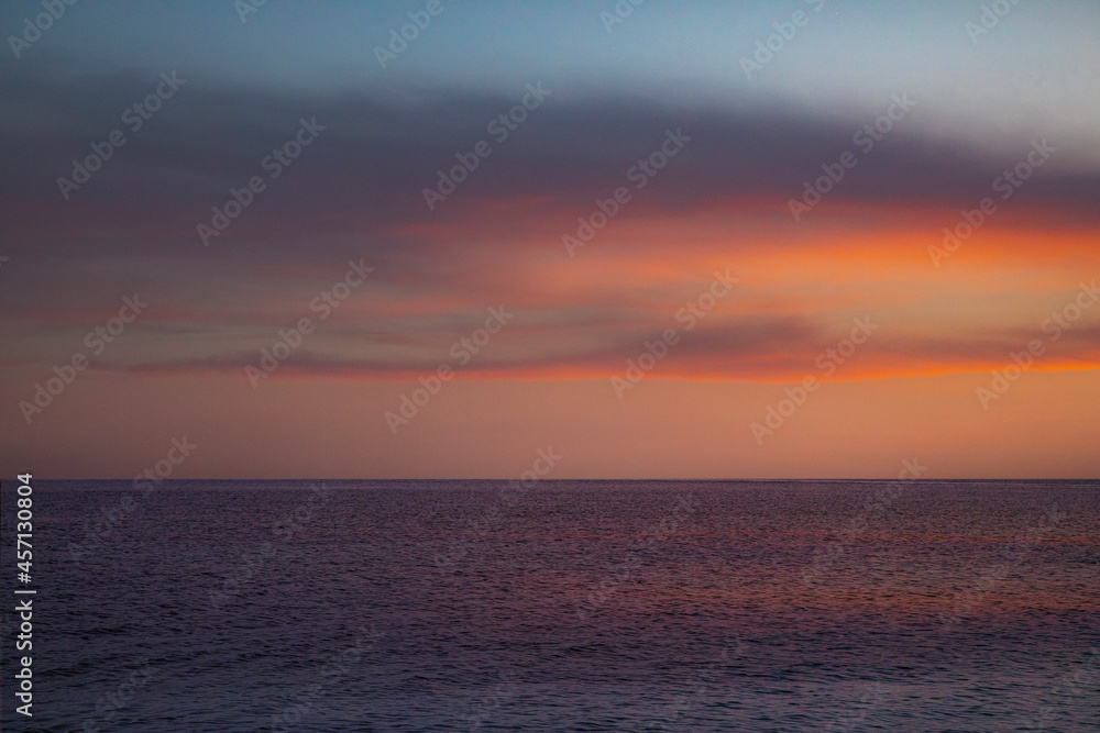 Sunset over the sea with a beautiful sky
