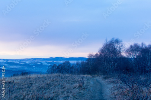 Kislovodsk, Russia. December 28, 2018. Evening view from a high mountain to the mountains and forest of Kislovodsk.