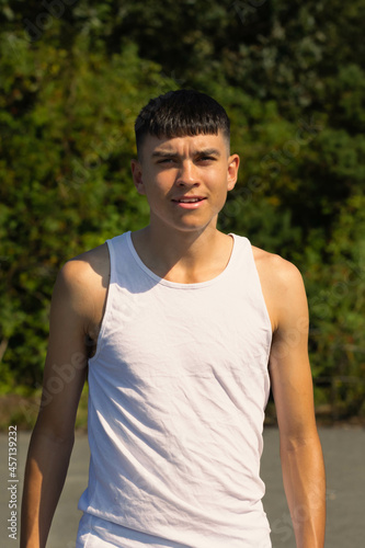 18 year old in a sleeveless top © Ben Gingell