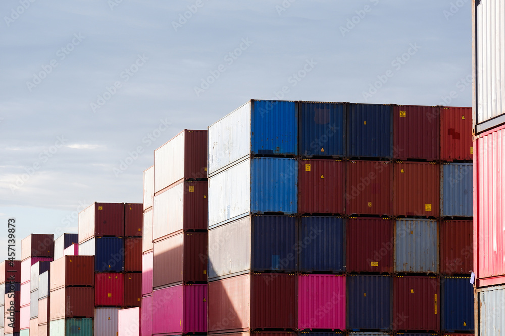 Freight, transportation, transportation, transportation, delivery and distribution. commercial business ideas Group of 40-foot heavy-duty colored metal containers stacked in the wharf. Freight, transportation, transportation, transportation, delivery and distribution. commercial business ideas Group of 40-foot heavy-duty colored metal containers stacked in the wharf.