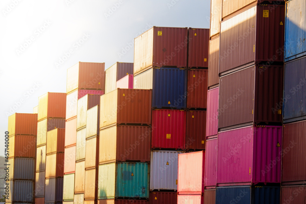 Freight, transportation, transportation, transportation, delivery and distribution. commercial business ideas Group of 40-foot heavy-duty colored metal containers stacked in the wharf. Freight, transportation, transportation, transportation, delivery and distribution. commercial business ideas Group of 40-foot heavy-duty colored metal containers stacked in the wharf.