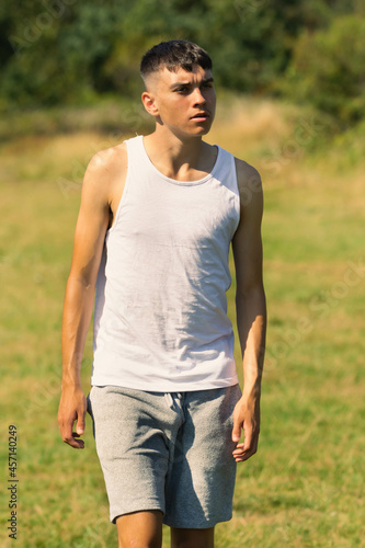 18 year old in a sleeveless top © Ben Gingell