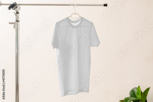 Plain white cotton t-shirt on hanger for your design