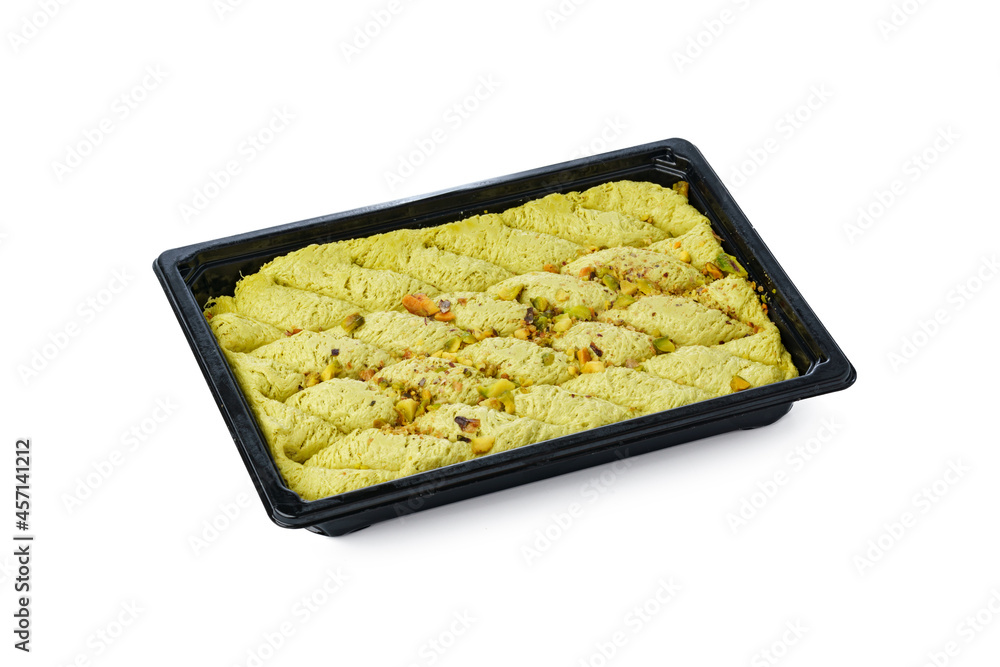 Black plastic box of Turkish halva dessert isolated on white Black plastic box of Turkish halva dessert isolated on white
