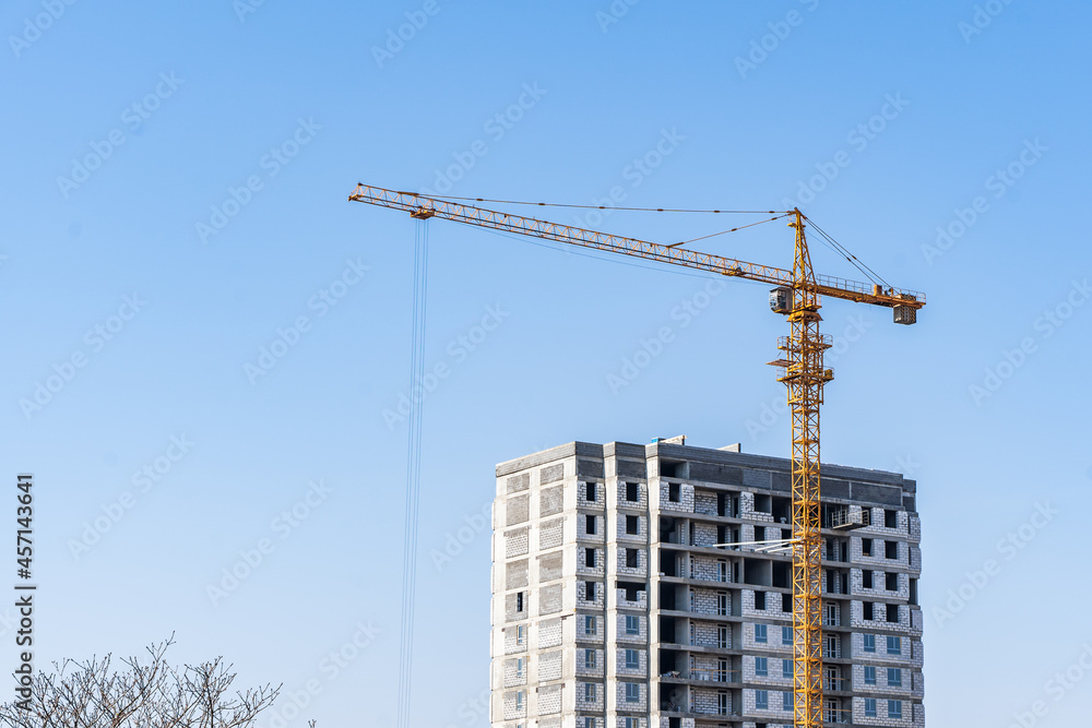 Picture of buildings under construction with construction crane