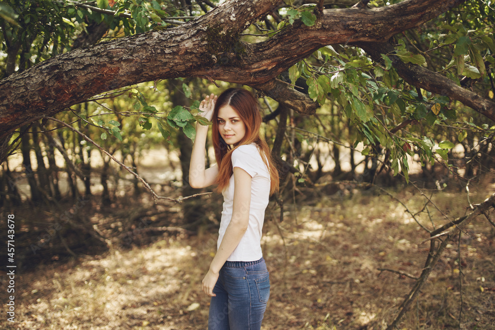 pretty woman outdoors by the tree nature Lifestyle summer pretty woman outdoors by the tree nature Lifestyle summer