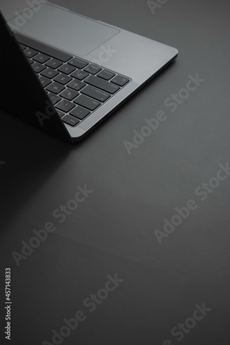 Grey laptop on Grey background