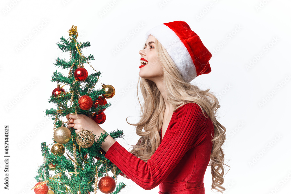 woman with christmas tree in hands toys holiday christmas decoration woman with christmas tree in hands toys holiday christmas decoration