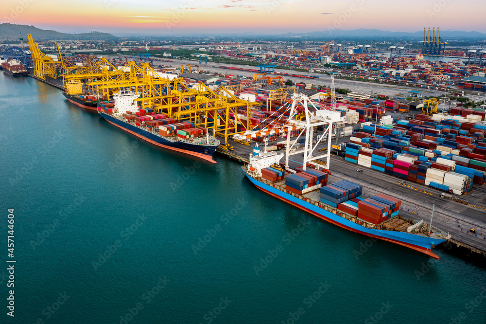 Containers ship and shipping ports cargo logistic freight load unloading by crane forwarding industry import export international worldwide, business services transportation of goods in ocean water.