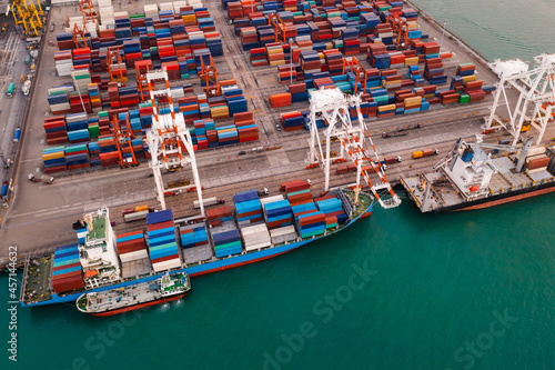 Containers ship and shipping ports cargo logistic freight load unloading by crane forwarding industry import export international worldwide, business services transportation of goods in ocean water