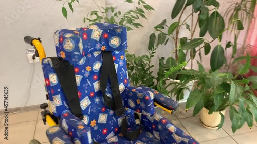 Children's wheelchair in the lobby of the rehabilitation center for children with disabilities