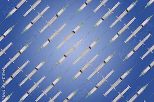 Syringe pattern with blue background. Covid-19 vaccine concept. Minimalistic pandemic scene.