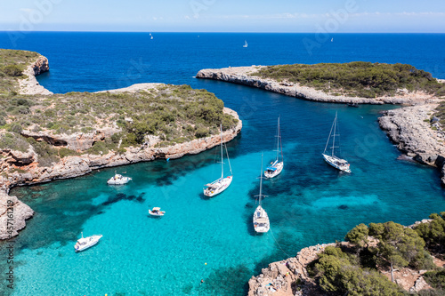 Aerial view, Cala Sa Nau, near Cala d'Or, with beaches and sailing boats, Migjorn region, Mallorca, Balearic Islands, Spain