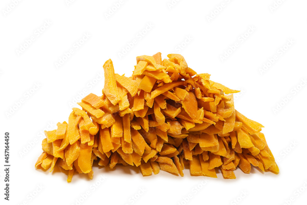 Dry tasty mango slices as a background. Dry tasty mango slices as a background.