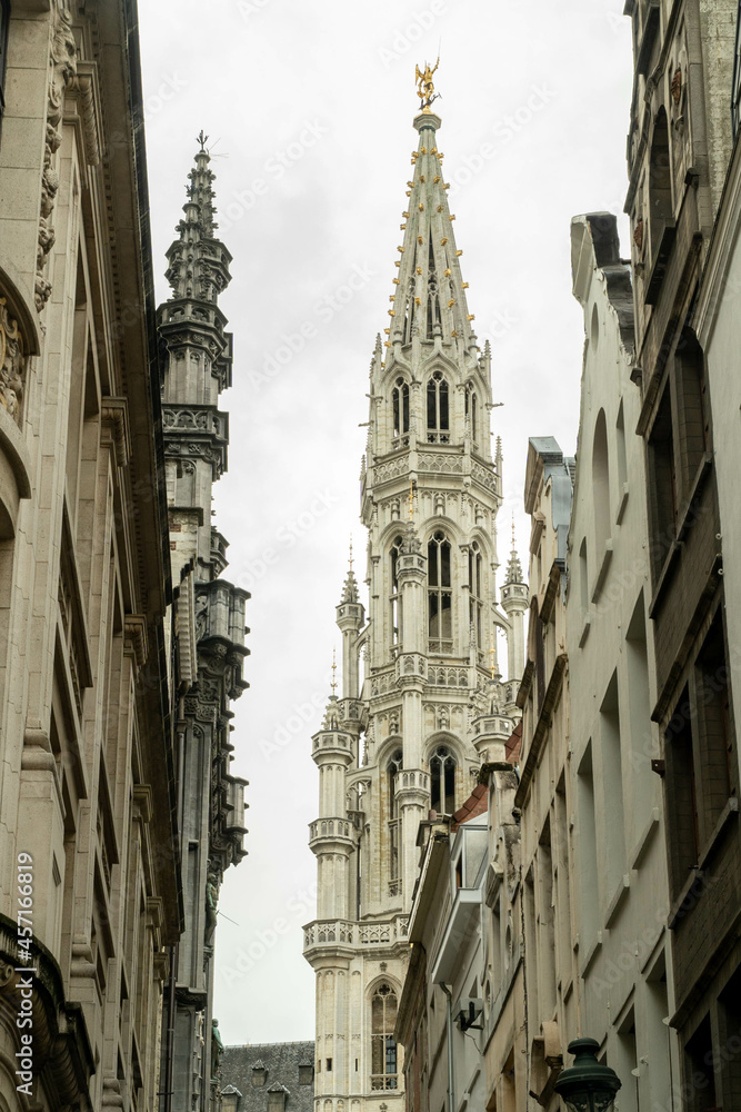 Bruges, Belgium. September 30, 2019: building facades and tower of the Brussels city hall.