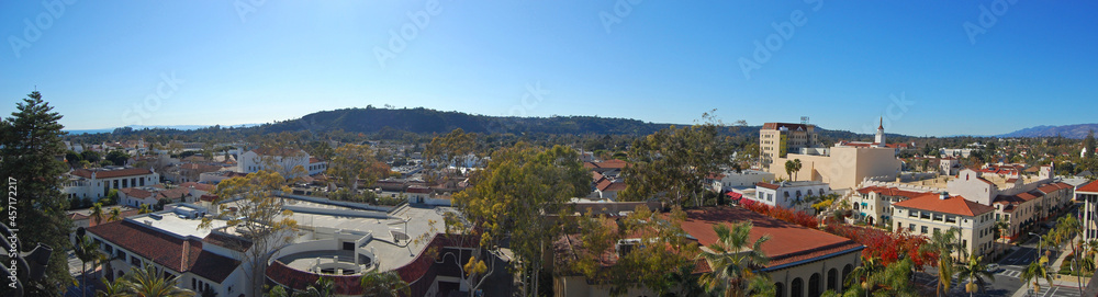 Aerial view of Santa Barbara historic city center with Santa Ynez Mountains at the background, from top of the clock tower of Santa Barbara County Courthouse, California CA, USA. 