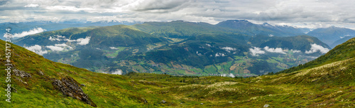 Fototapeta Naklejka Na Ścianę i Meble -  Views of foggy mountains meadows from Molden hike in Norway