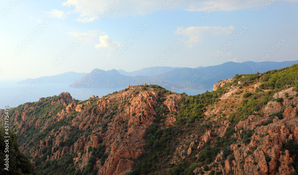 Red rocks in northeastern Corsica during sunset near the town called Piana