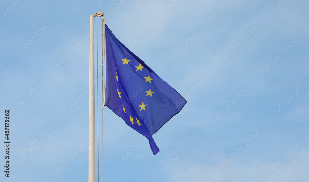 European flag on the blue sky