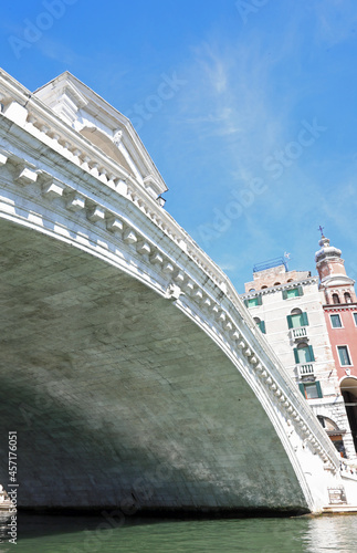 very suggestive view of the Rialto Bridge photographed from below from a gondola boat