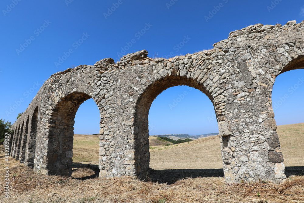 arches of an ancient Roman aqueduct that was used to bring drinking water from the countryside to the great city of Rome