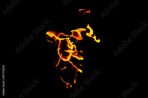 Real flames from underground gas isolated on black © photografiero