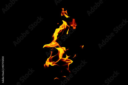 Real flames from underground gas isolated on black