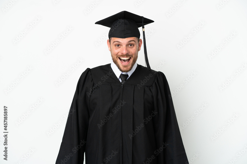 Young university Brazilian graduate isolated on white background with surprise facial expression Young university Brazilian graduate isolated on white background with surprise facial expression