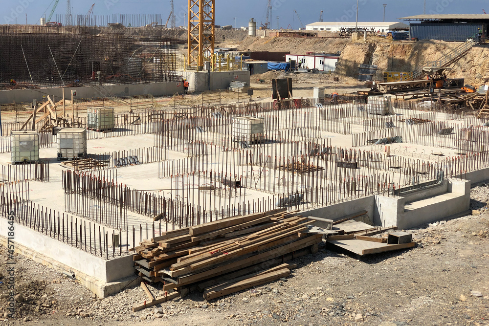 Reinforced concrete foundation and metal reinforcement outlets
