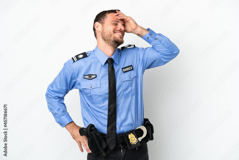 Young police Brazilian man isolated on white background smiling a lot Young police Brazilian man isolated on white background smiling a lot
