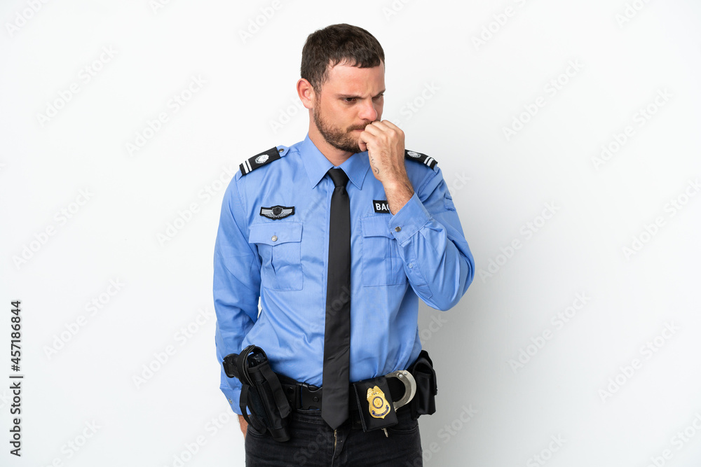 Young police Brazilian man isolated on white background having doubts Young police Brazilian man isolated on white background having doubts