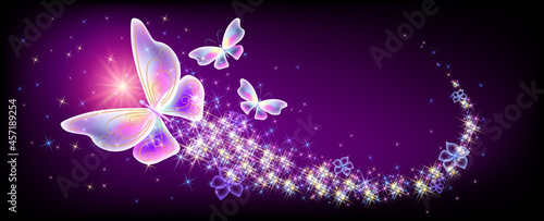 Flying delightful butterflies with sparkle and blazing trail flying in night sky among shiny glowing stars in cosmic space. Animal protection day concept.