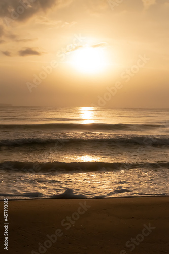 Fototapeta Naklejka Na Ścianę i Meble -  sunrise on the beach sun, orange light