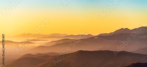 Panorama of Layers of Mountains at Sunset, Sunrise