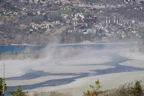 dust storm on serre ponçon lake alps france by embrun town