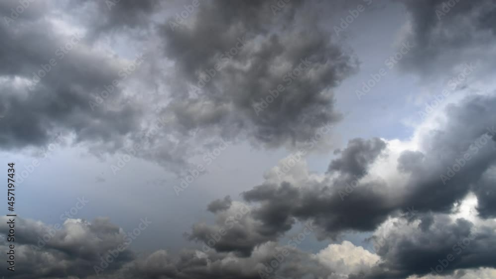 Big grey stormy clouds moving fast against the blue sky. Cloudscape timelapse. Big grey stormy clouds moving fast against the blue sky. Cloudscape timelapse.