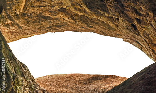 Entrance of cave or grotto isolated on white background