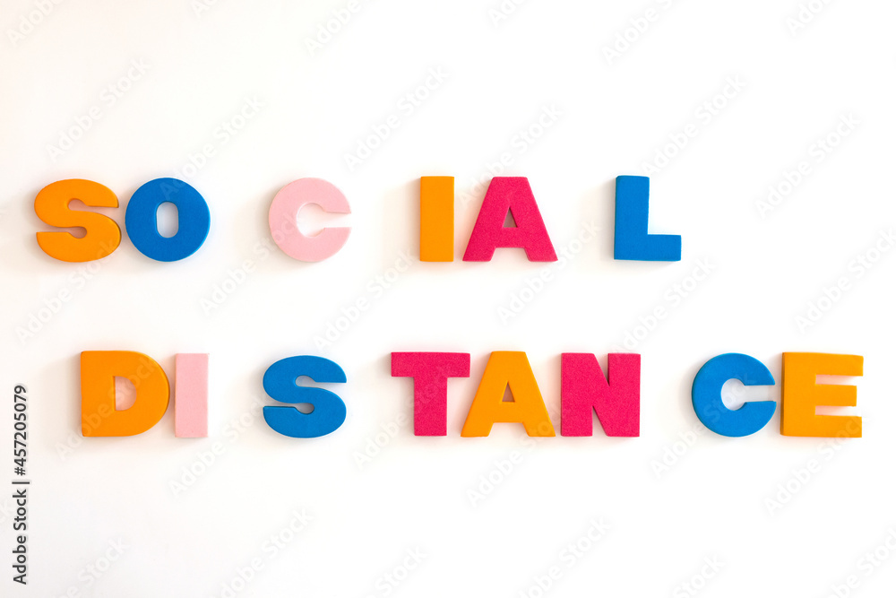Word made up of multicolored letters. Social distance