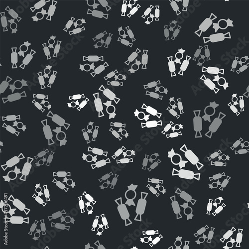 Grey Candy icon isolated seamless pattern on black background. Happy Halloween party. Vector