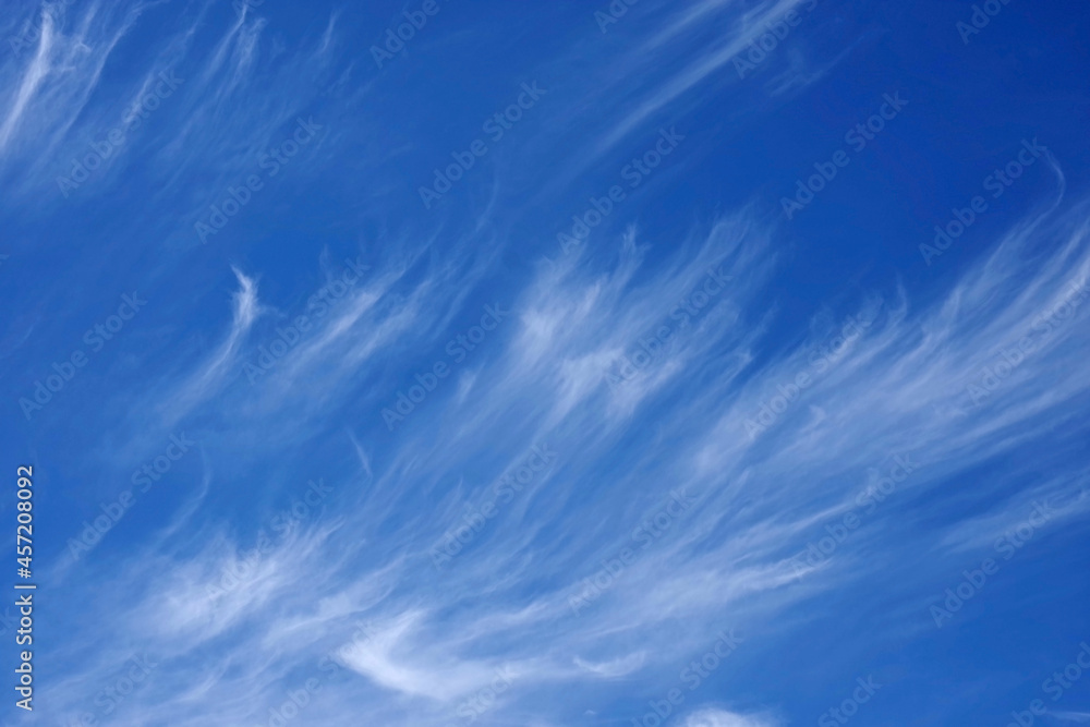 Full frame view of a blue sky with white cirrus clouds Full frame view of a blue sky with white cirrus clouds