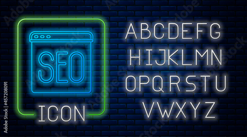 Glowing neon SEO optimization icon isolated on brick wall background. Neon light alphabet. Vector