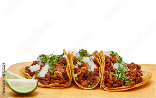 Obraz na plátně Tacos al pastor, tradicional comida mexicana, con cebolla, cilantro, piña, salsa roja o guacamole