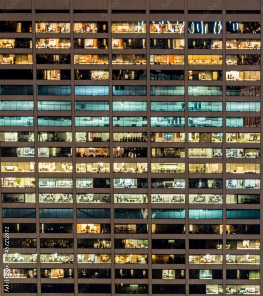 Office windows illuminated at night Office windows illuminated at night