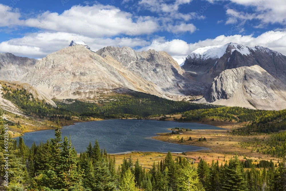 Scenic Landscape View of Beautiful Baker Lake on a Fall Hike in Skoki Area of Banff National Park with Rugged Canadian Rocky Mountain Peaks on Skyline