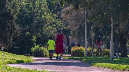 Valencia Spain Turia running park timelapse, resort sity, activities and fitness, family with childrens 4K