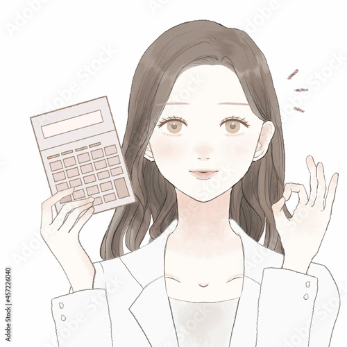 初心者マークを持つ、OKサインを出す女性医師