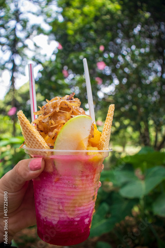 Ice-based drink, typical tropical fruits of the city of Cali and sweeteners photo