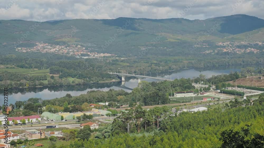 Beautiful landscape of the Goian friendship bridge between Spain and Portugal over the Minho river, from Vilanova de Cerveira (Portugal) Beautiful landscape of the Goian friendship bridge between Spain and Portugal over the Minho river, from Vilanova de Cerveira (Portugal)